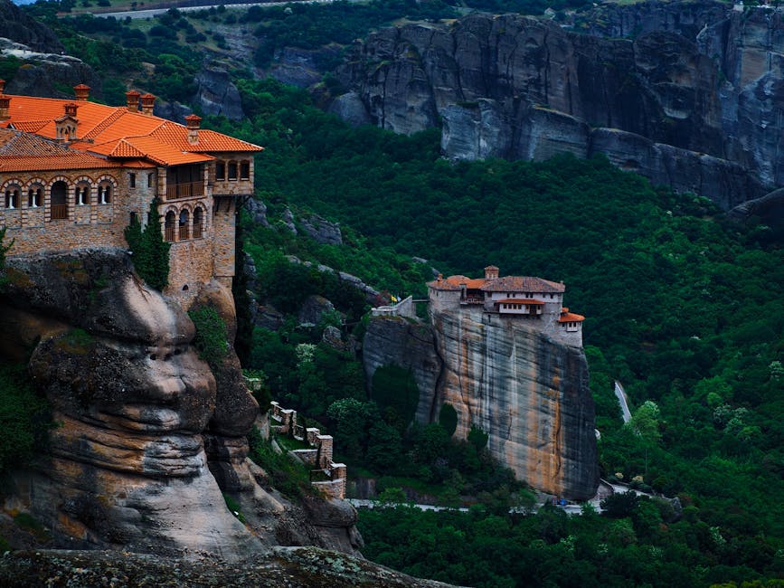 Meteora rock pillars surrounded by greenery