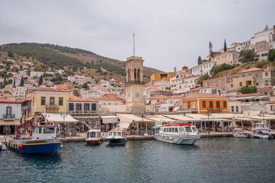 Hydra harbor clock tower stone houses