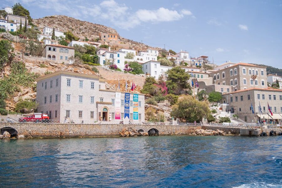 Hydra hillside stone houses harbour Greece