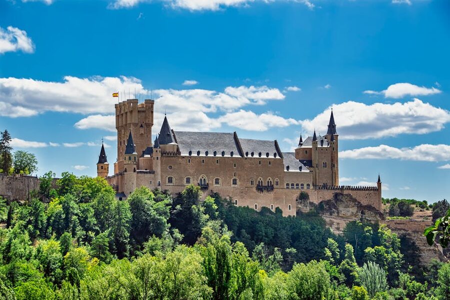 Alcazar of Segovia against blue sky