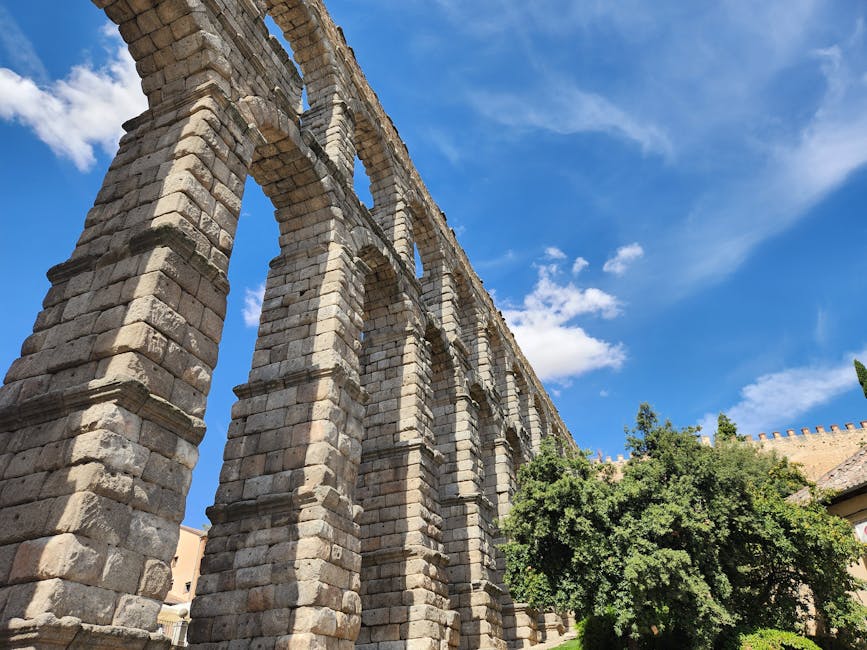 Roman aqueduct of Segovia under clear blue sky