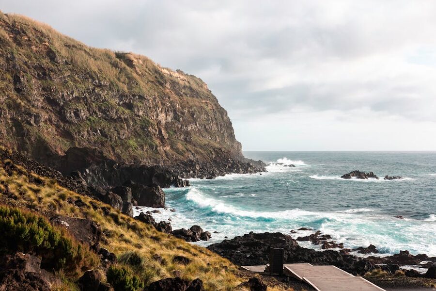 Sao Miguel cliffs with crashing waves Azores