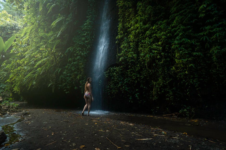 Waterfall cascading in a lush Bali rainforest
