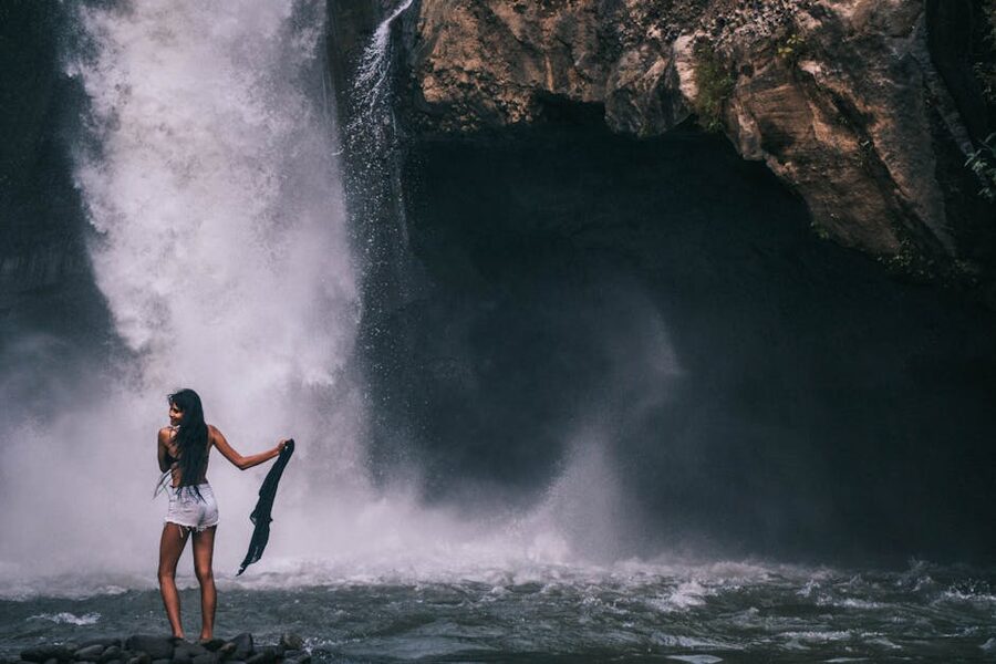 Waterfall cascading through jungle in Bali
