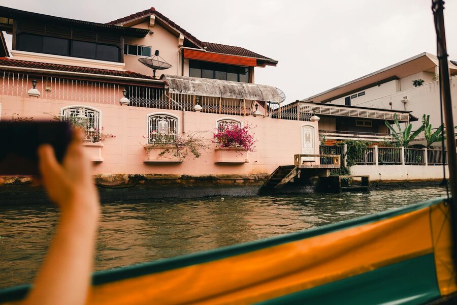 Traditional canal-side houses lining a Bangkok klong