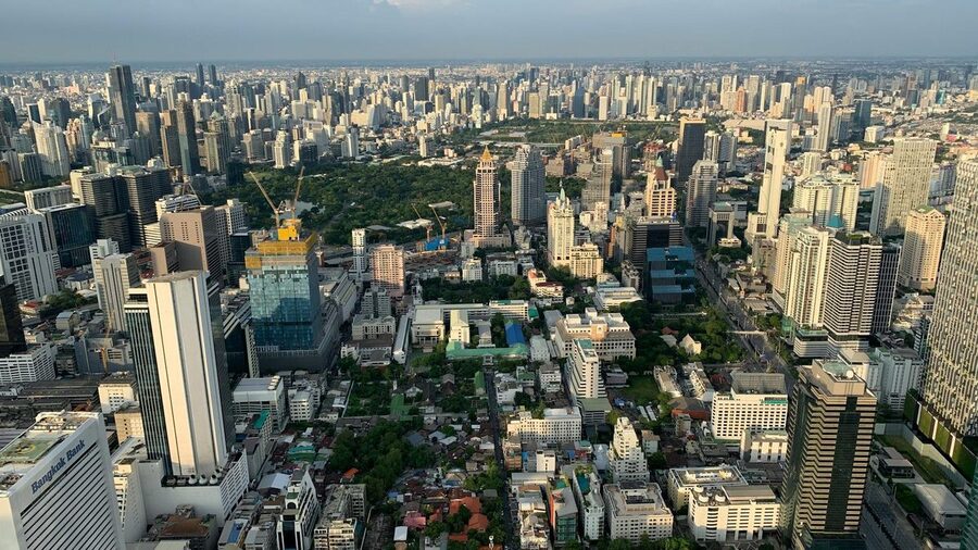 Aerial view of Bangkok skyline with dense skyscrapers