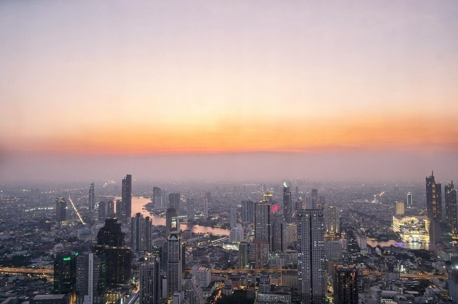 Aerial view of Bangkok skyscrapers at sunset