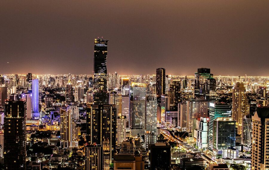 Bangkok night skyline with illuminated skyscrapers