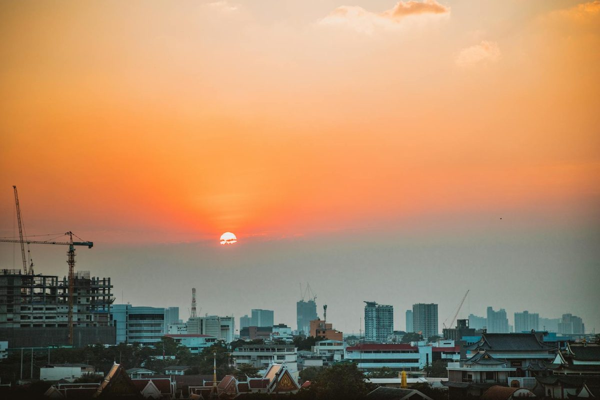Bangkok skyline during golden orange sunset