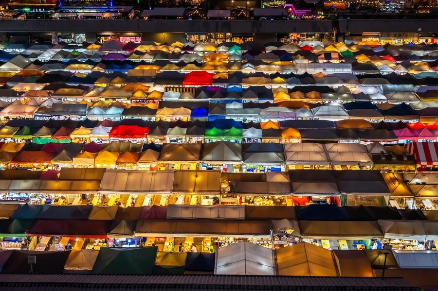 Aerial view of colorful night market stalls in Bangkok Thailand