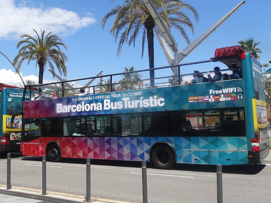 Barcelona Bus Turistic blue open-top double decker on a city street