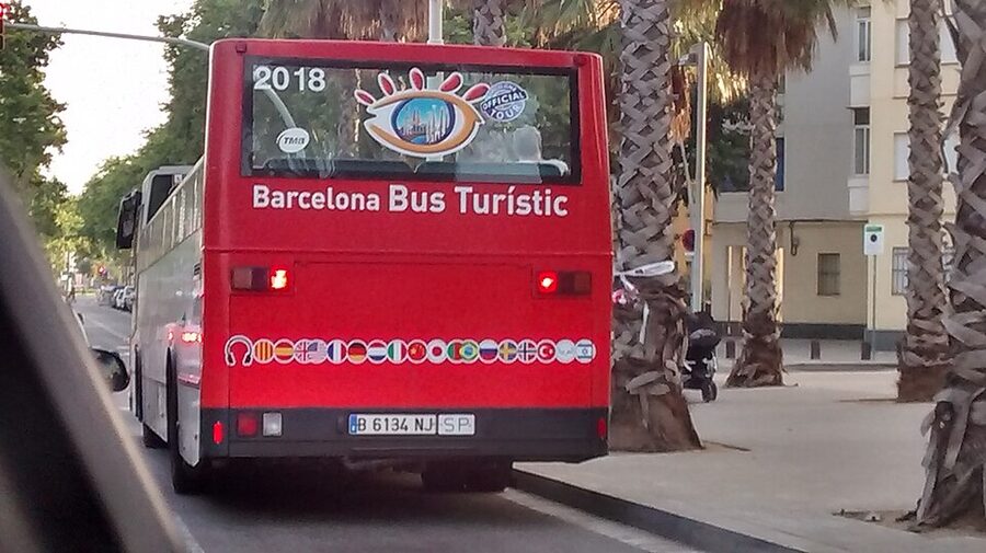 TMB Barcelona Bus Turistic in Barcelona traffic