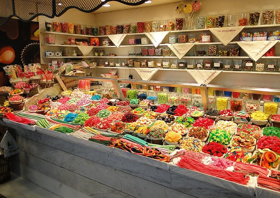 La Boqueria market aisle in Barcelona with vendors