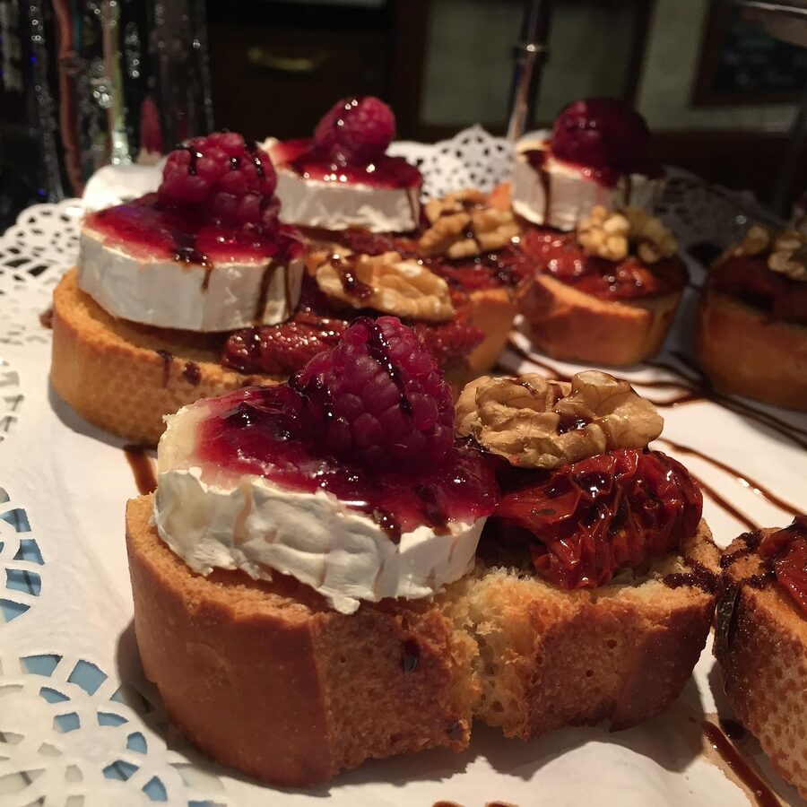Spanish pincho and tapas spread with cheese cuts