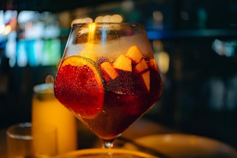 Glass of sangria with fresh fruits in Spain