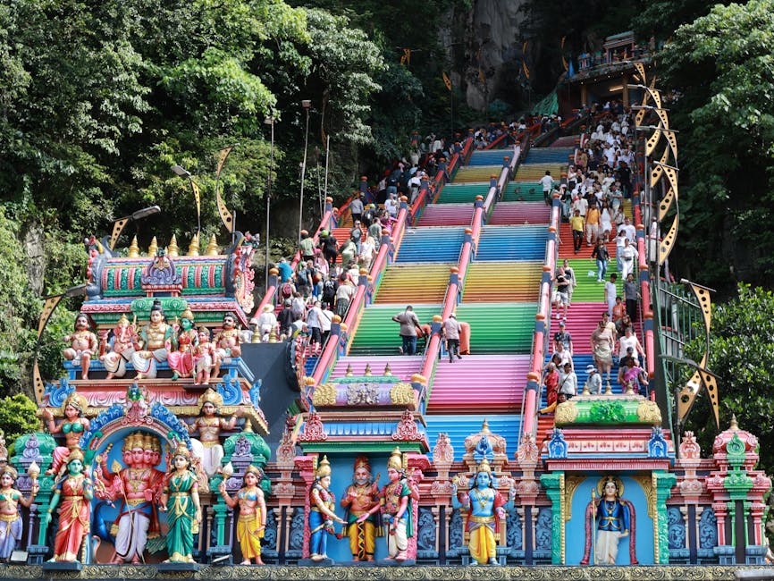 The painted rainbow stairs of Batu Caves from below
