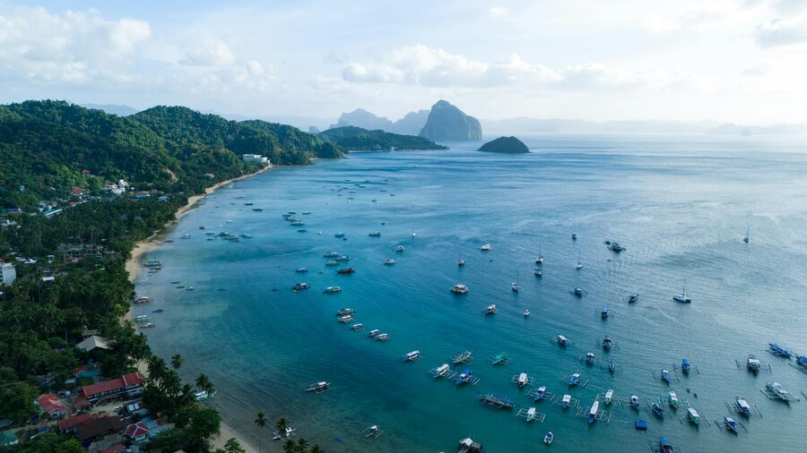 Aerial view of El Nido bay with lush islands and blue water