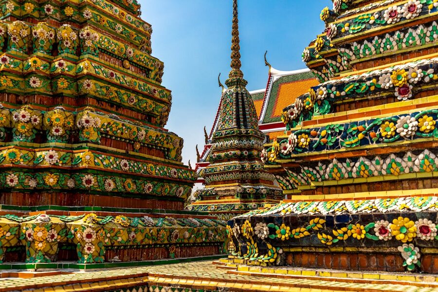 Colorful ornate temples of Wat Pho in Bangkok with detailed Thai architecture