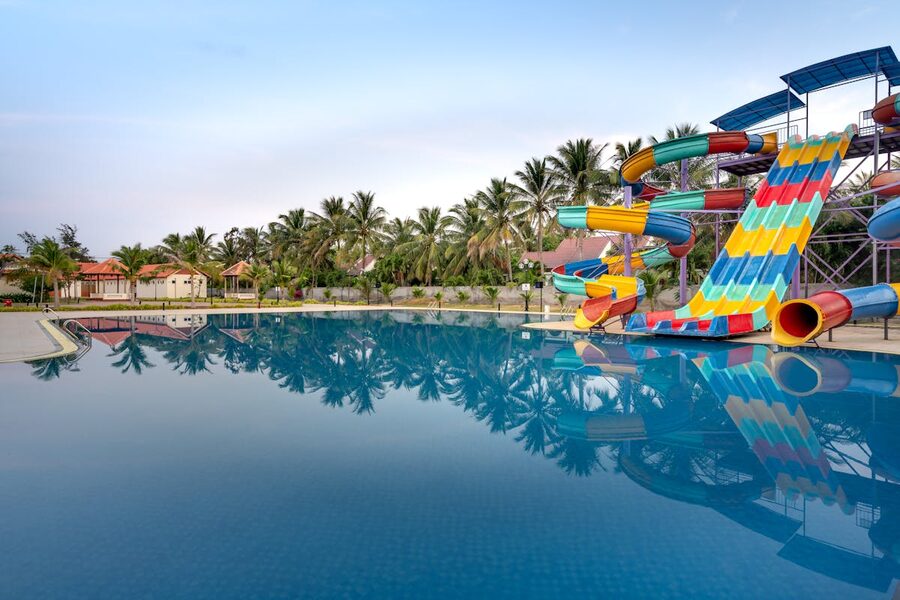 Colorful water slides and pool at a summer water park