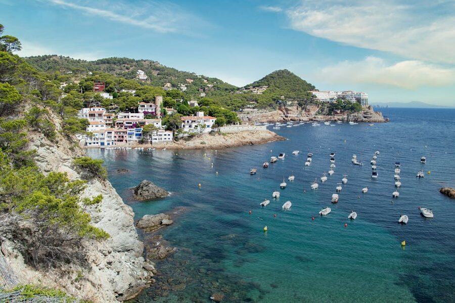 Tossa de Mar coastline with medieval walls and turquoise sea