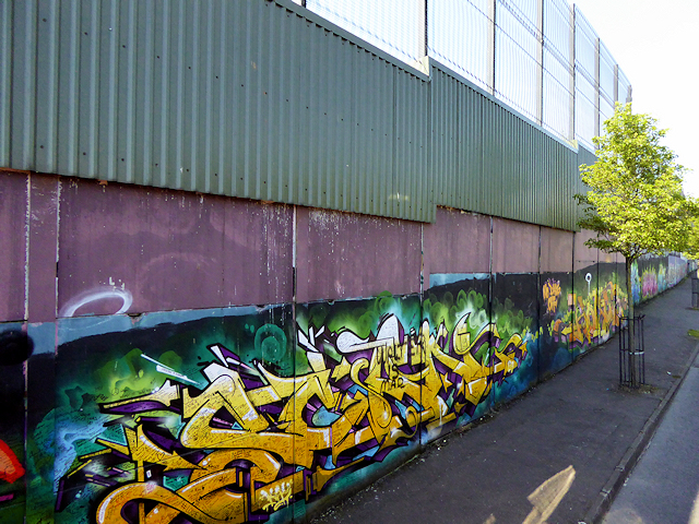 The Peace Wall along Cupar Way in West Belfast