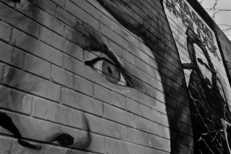 Sorrowful face on a Belfast wall mural