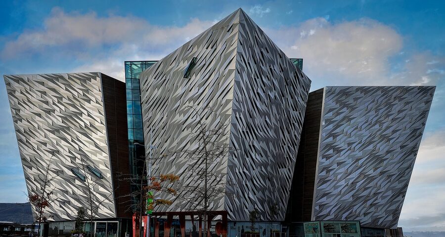 Titanic Quarter museum building with reflective glass and aluminium hulls