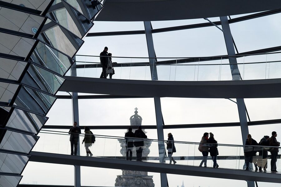 Silhouettes of visitors walking the Reichstag dome spiral ramp