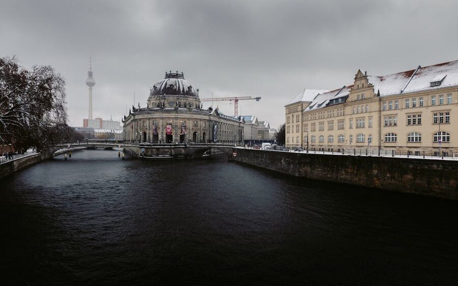 Snow-covered Bode Museum and Spree River with TV Tower