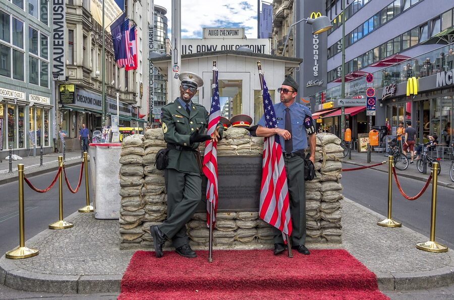 Checkpoint Charlie Berlin guards and flags