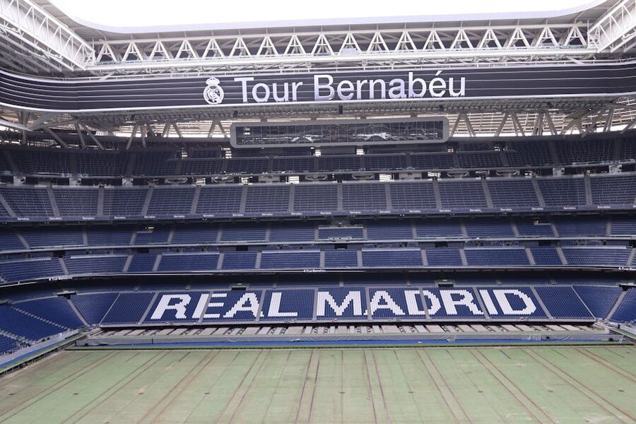 Panoramic interior view of Santiago Bernabéu pitch from upper tier