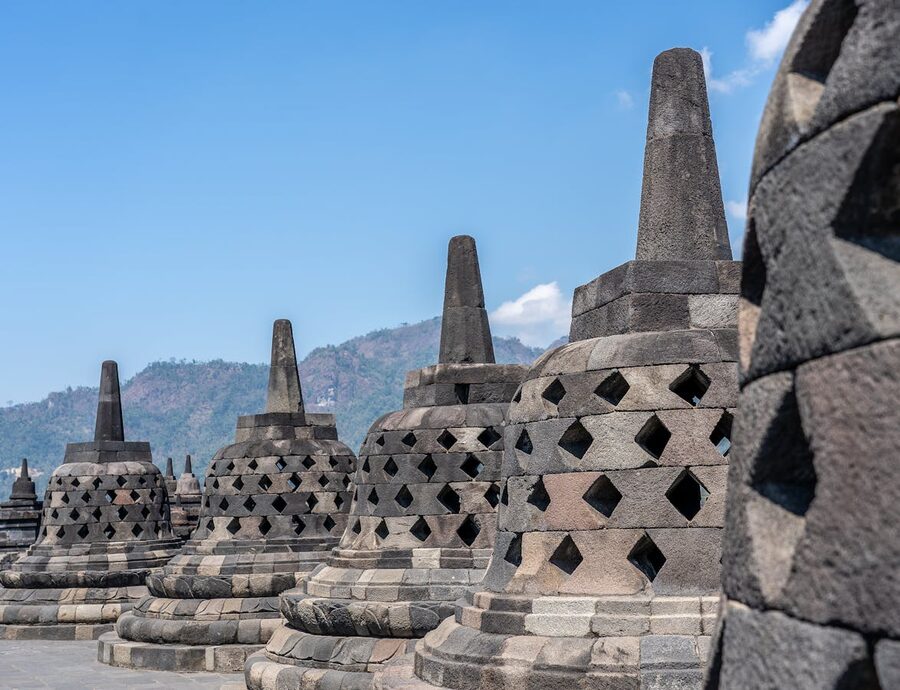 Row of bell-shaped perforated stupas at Borobudur