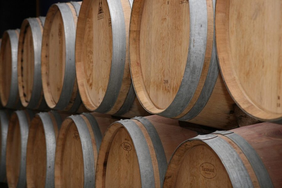 Bordeaux winery oak barrels stacked