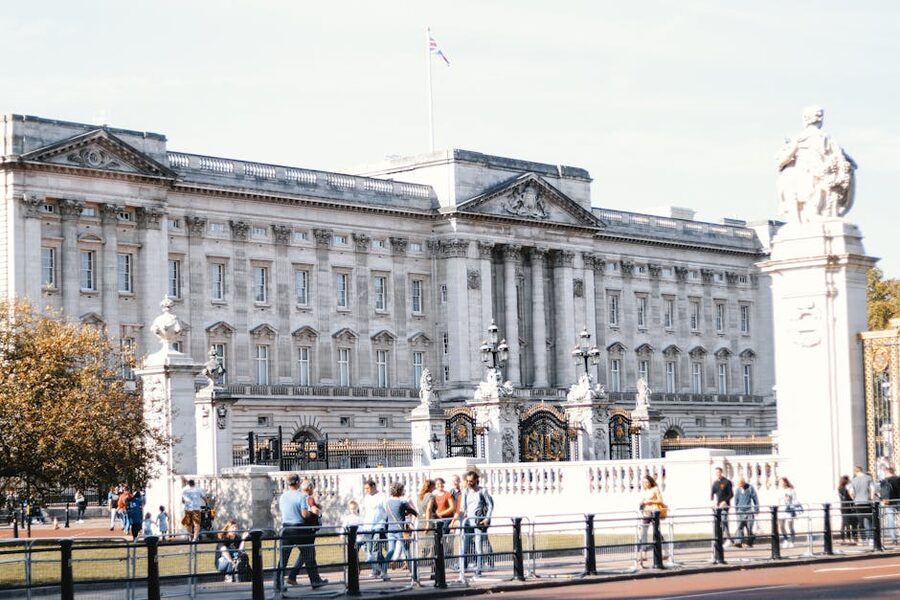 Buckingham Palace facade with visitors crowd