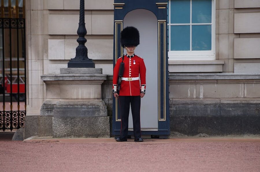 British royal guard red uniform Buckingham Palace