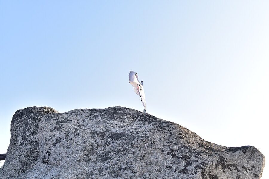 Baegundae Peak summit with Korean flag Bukhansan National Park