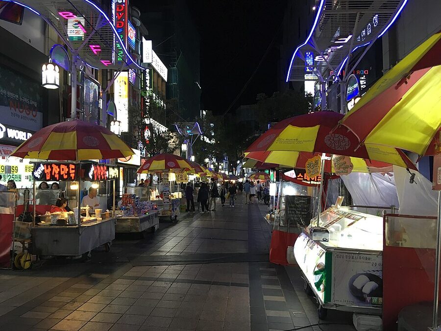 BIFF Square at night with food stalls and crowds in Busan