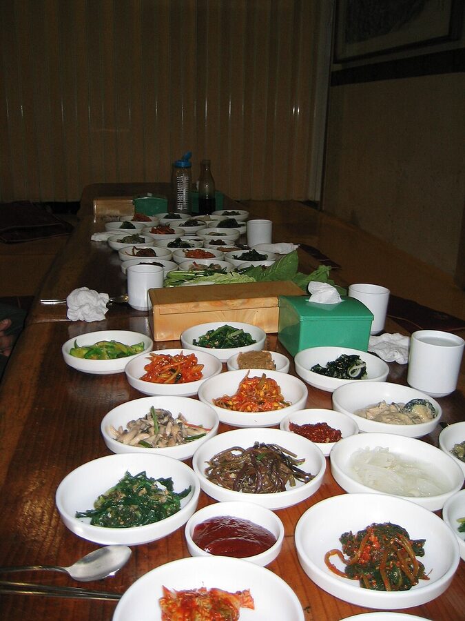 Korean banchan side dishes in a home meal setting