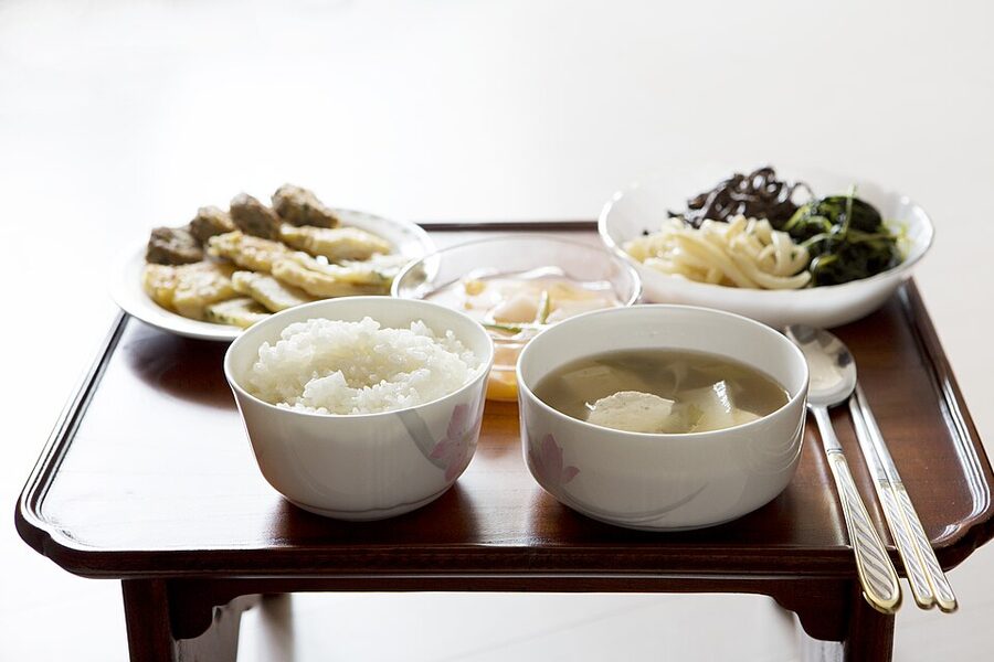 Traditional Korean bapsang table setting with rice and side dishes