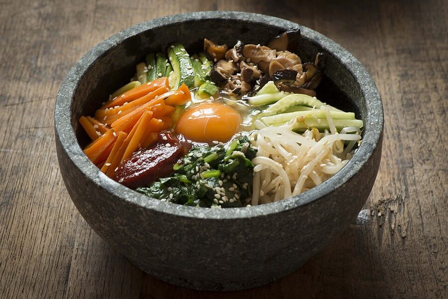 Dolsot bibimbap in a sizzling hot stone bowl