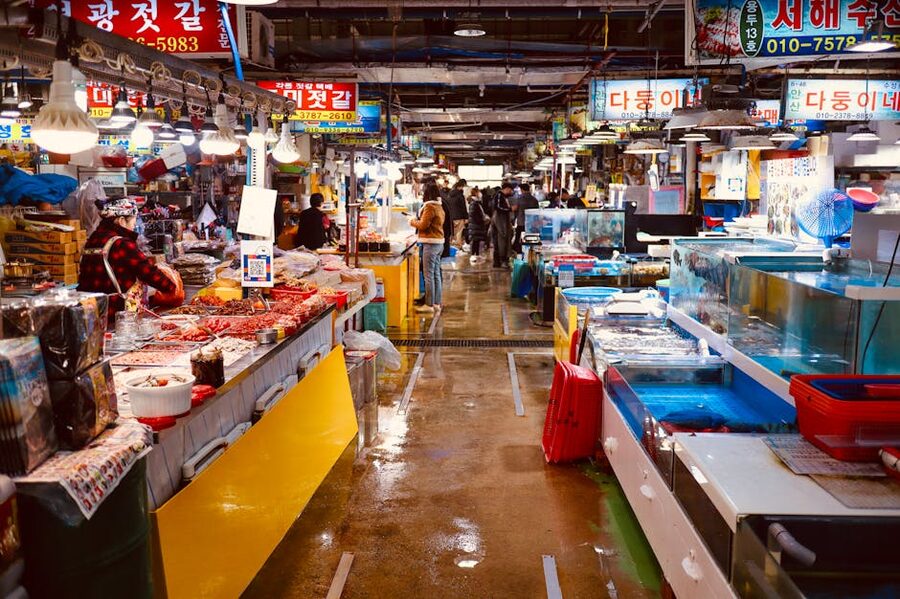 Indoor seafood market with various stalls