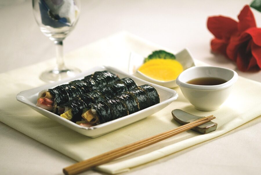 Korean kimbap seaweed rice rolls with chopsticks
