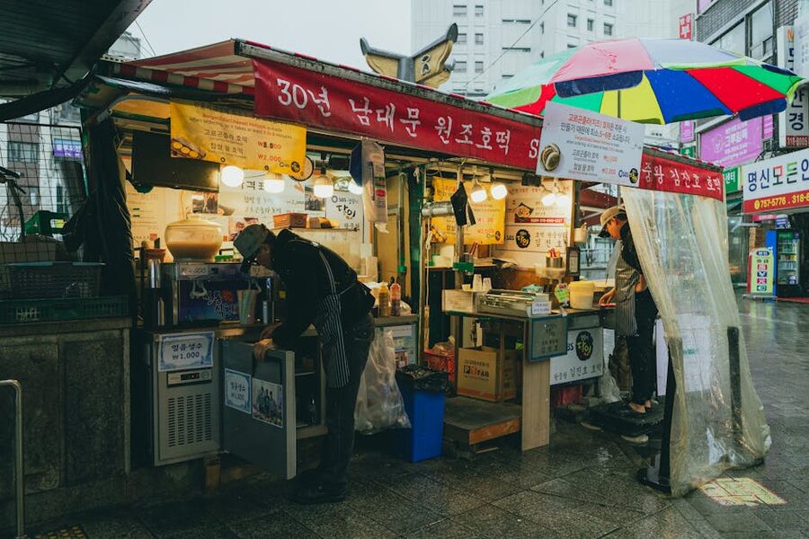 Busy Korean street food stall at night