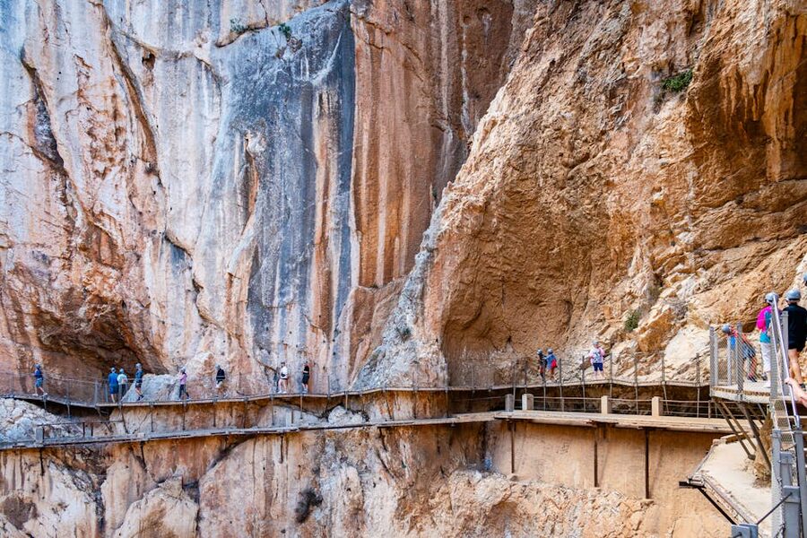 Hikers walking along the King's Little Path Caminito del Rey