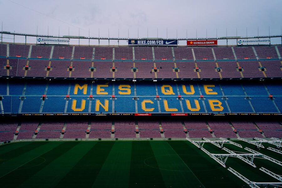 Camp Nou stands showing the Mes Que Un Club slogan