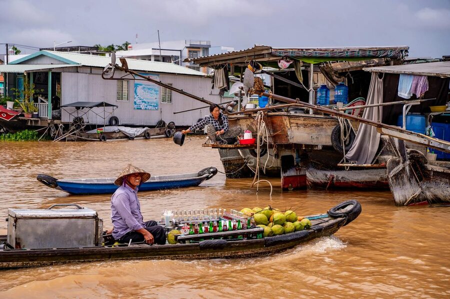 Boats and fresh produce at the floating market in Can Tho