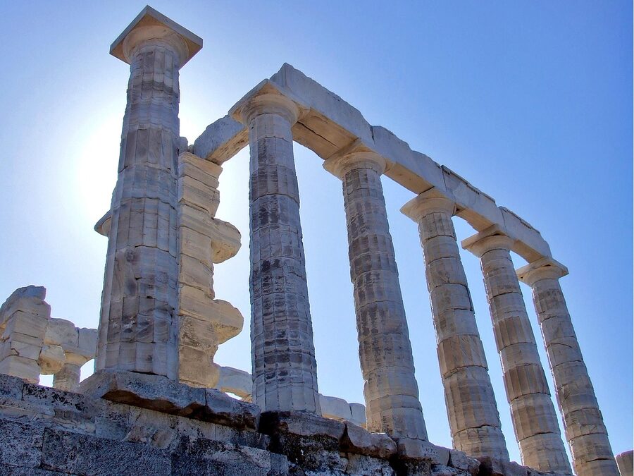 Marble columns of Temple of Poseidon at Cape Sounion at sunset