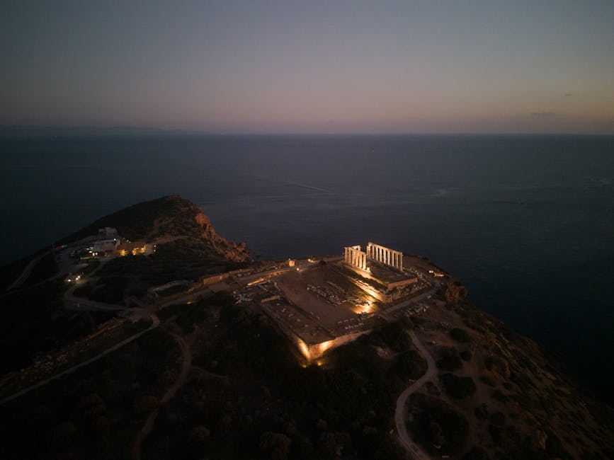 Aerial twilight shot of Temple of Poseidon at Cape Sounion