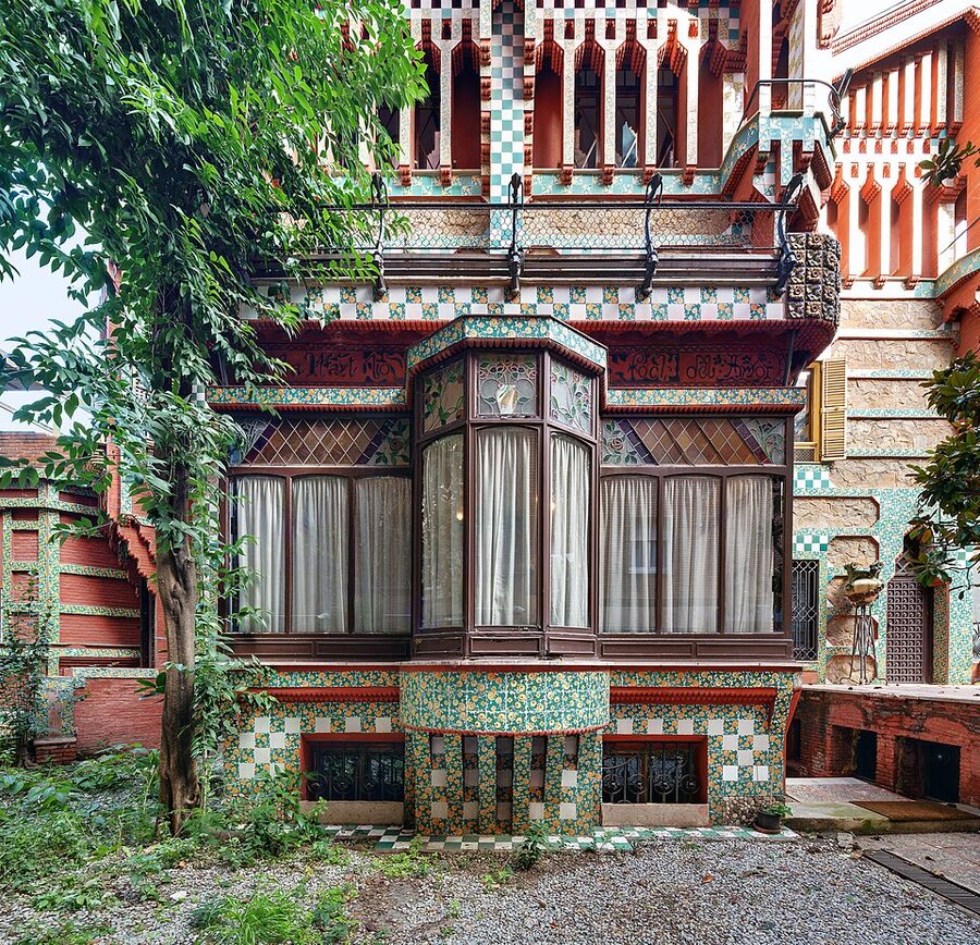 Casa Vicens balcony with cast iron railing and white tile panels in Barcelona
