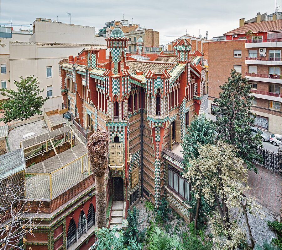 Casa Vicens facade in Barcelona by Antoni Gaudi with green and white tile stripes